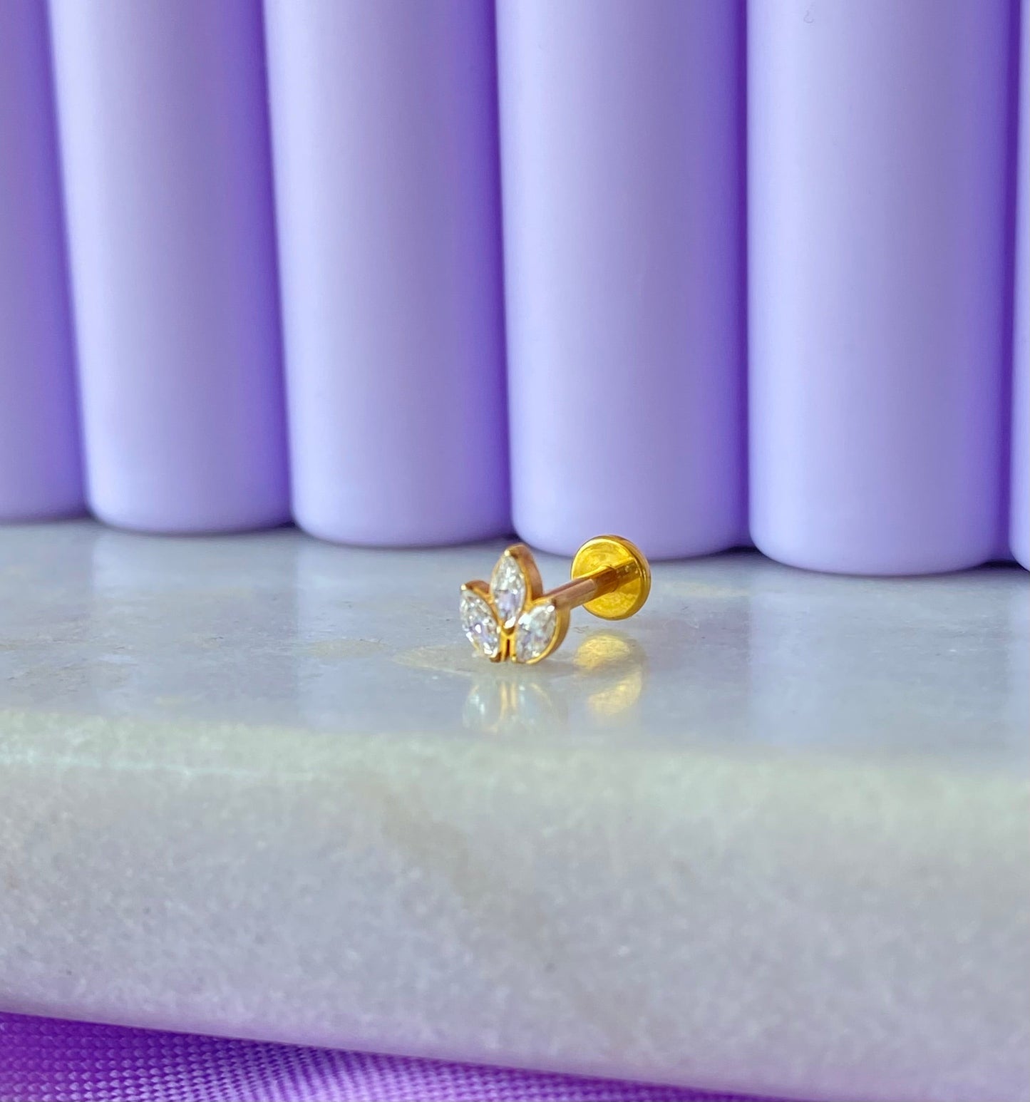 Capullo Dorado Titanio Diseño